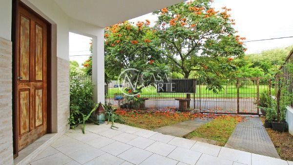 Casa à venda com 3 quartos, 177m², 1 suíte, 2 vagas, Rua Canisio Binsfeld no bairro Hípica em Porto Alegre