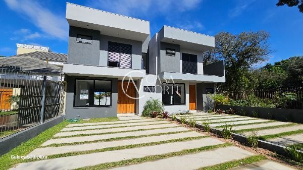 Casa à venda com 3 quartos, 187m², 3 suítes, 2 vagas, Rua Jacarei no bairro Ipanema em Porto Alegre