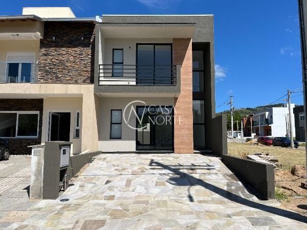 Casa de Condomínio à venda com 3 quartos, 143m², 1 suíte, 2 vagas, Estrada Jorge Pereira Nunes no bairro Campo Novo em Porto Alegre