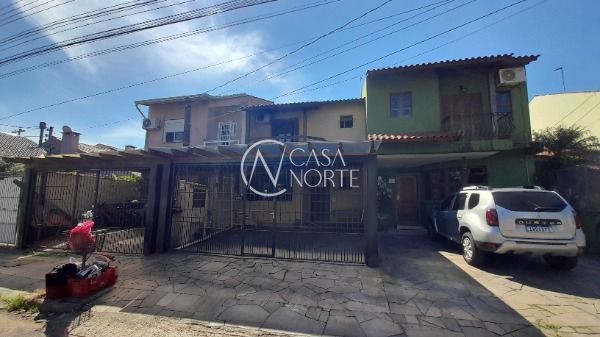 Casa à venda com 3 quartos, 133m², 2 vagas, Rua Michael Motta Seelig no bairro Hípica em Porto Alegre