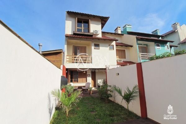 Casa à venda com 4 quartos, 178m², 2 suítes, 2 vagas, Rua Kyve T. Knijnik no bairro Espírito Santo em Porto Alegre