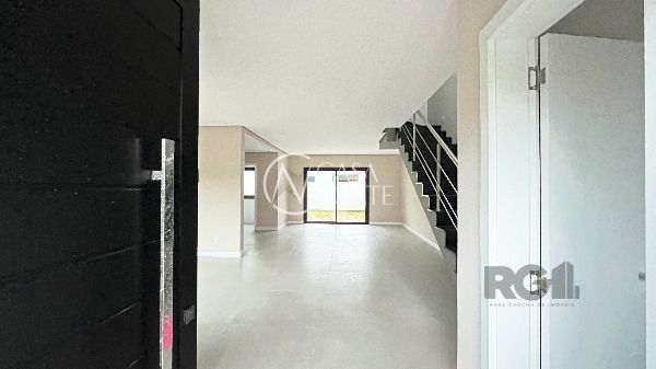 Casa de Condomínio à venda com 3 quartos, 136m², 1 suíte, 2 vagas, Rua Jean Vardaramatos no bairro Hípica em Porto Alegre