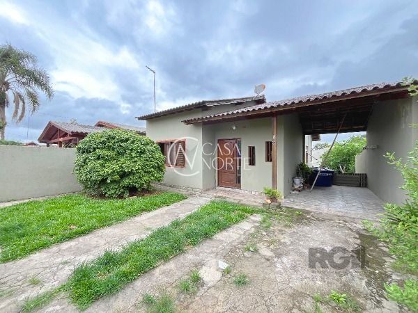 Casa à venda com 3 quartos, 80m², 2 vagas, Rua Bougainville no bairro Lageado em Porto Alegre