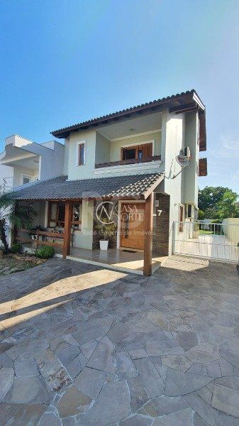 Casa de Condomínio à venda com 3 quartos, 221m², 1 suíte, 3 vagas, Edgar Pires de Castro no bairro Hípica em Porto Alegre