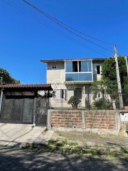 Casa à venda com 3 quartos, 91m², 1 suíte, 2 vagas, Rua Jóia no bairro Vila Nova em Porto Alegre