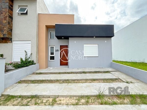 Casa de Condomínio à venda com 3 quartos, 102m², 1 suíte, 2 vagas, Rua Jean Vardaramatos no bairro Hípica em Porto Alegre