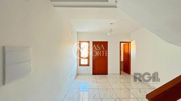 Casa à venda com 2 quartos, 79m², 2 suítes, 2 vagas, Rua Helio Felix Frey no bairro Espírito Santo em Porto Alegre