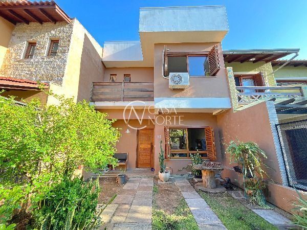 Casa à venda com 3 quartos, 137m², 1 suíte, 2 vagas, Rua Irany de Oliveira Santanna no bairro Hípica em Porto Alegre