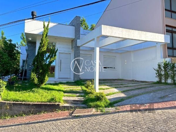 Casa de Condomínio à venda com 3 quartos, 184m², 1 suíte, 2 vagas, Avenida Juca Batista no bairro Aberta dos Morros em Porto Alegre