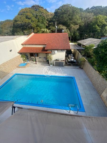 Casa à venda com 3 quartos, 300m², 1 suíte, 2 vagas, Rua Marcirio da Silva Barbosa no bairro Aberta dos Morros em Porto Alegre