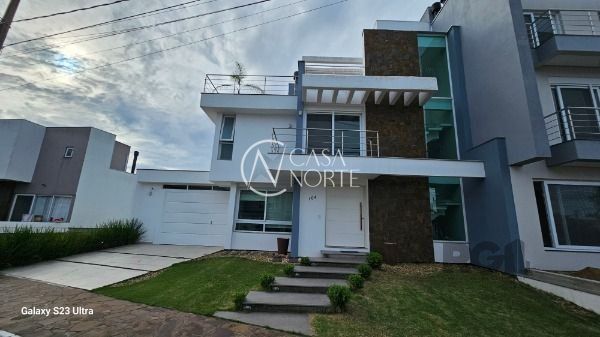 Casa à venda com 3 quartos, 248m², 1 suíte, 2 vagas, Rua Eroni Soares Machado no bairro Hípica em Porto Alegre