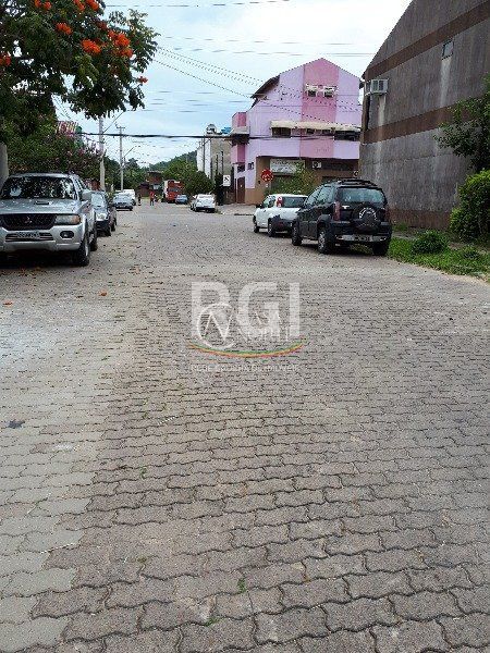 Terreno à venda  com 129m², Rua Paulo Stuart Wright no bairro Hípica em Porto Alegre