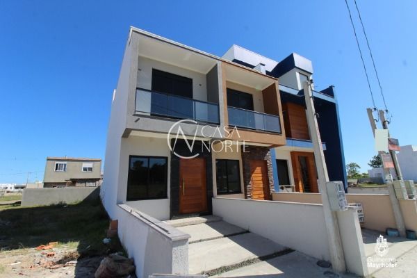 Casa à venda com 2 quartos, 107m², 2 suítes, 1 vaga, Affonso Lunardelli no bairro Hípica em Porto Alegre