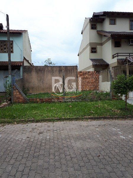 Terreno à venda  com 129m², Rua Paulo Stuart Wright no bairro Hípica em Porto Alegre