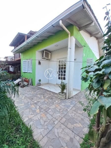 Casa à venda com 2 quartos, 75m², 1 vaga, Rua Elmo Born no bairro Hípica em Porto Alegre