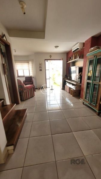 Casa de Condomínio à venda com 2 quartos, 122m², 1 vaga, Avenida Edgar Pires de Castro no bairro Hípica em Porto Alegre