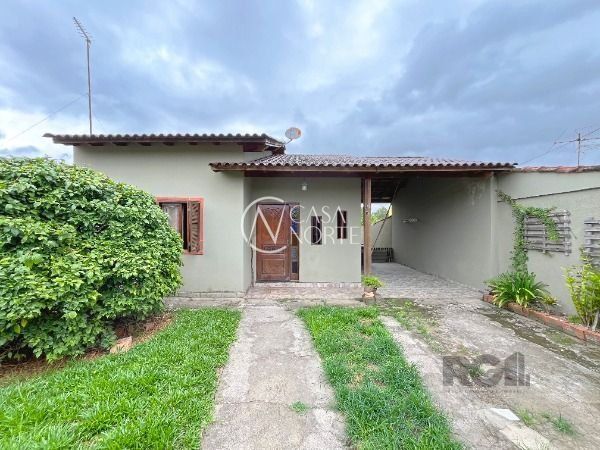 Casa à venda com 3 quartos, 80m², 2 vagas, Rua Bougainville no bairro Lageado em Porto Alegre