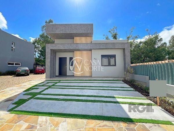 Casa à venda com 3 quartos, 120m², 1 suíte, 2 vagas, Rua Carlos Maximiliano Fayet no bairro Hípica em Porto Alegre