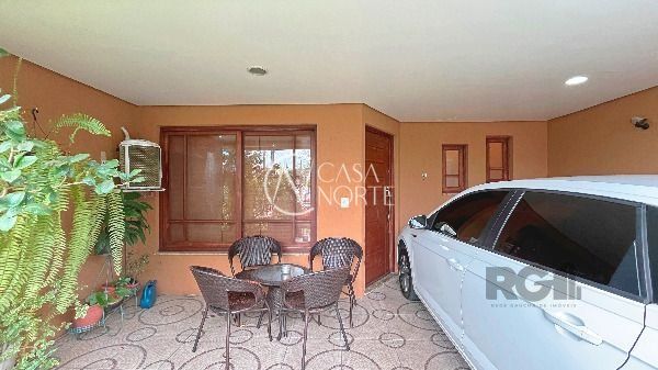 Casa à venda com 3 quartos, 130m², 1 suíte, 2 vagas, Rua Irany de Oliveira Santanna no bairro Hípica em Porto Alegre