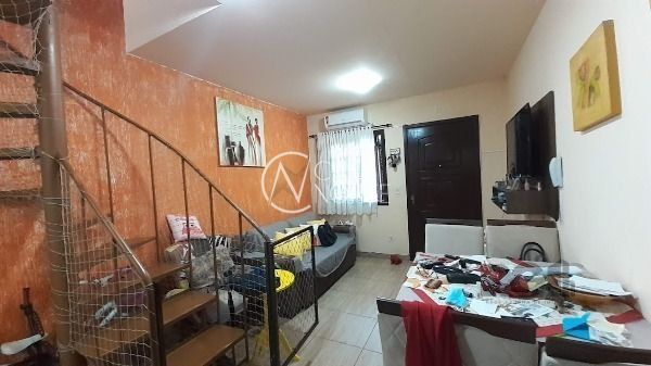 Casa de Condomínio à venda com 3 quartos, 60m², 1 vaga, Avenida Monte Cristo no bairro Vila Nova em Porto Alegre