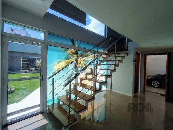 Casa à venda com 3 quartos, 450m², 1 suíte, 2 vagas, Rua Luzinete Alves Aragon no bairro Hípica em Porto Alegre