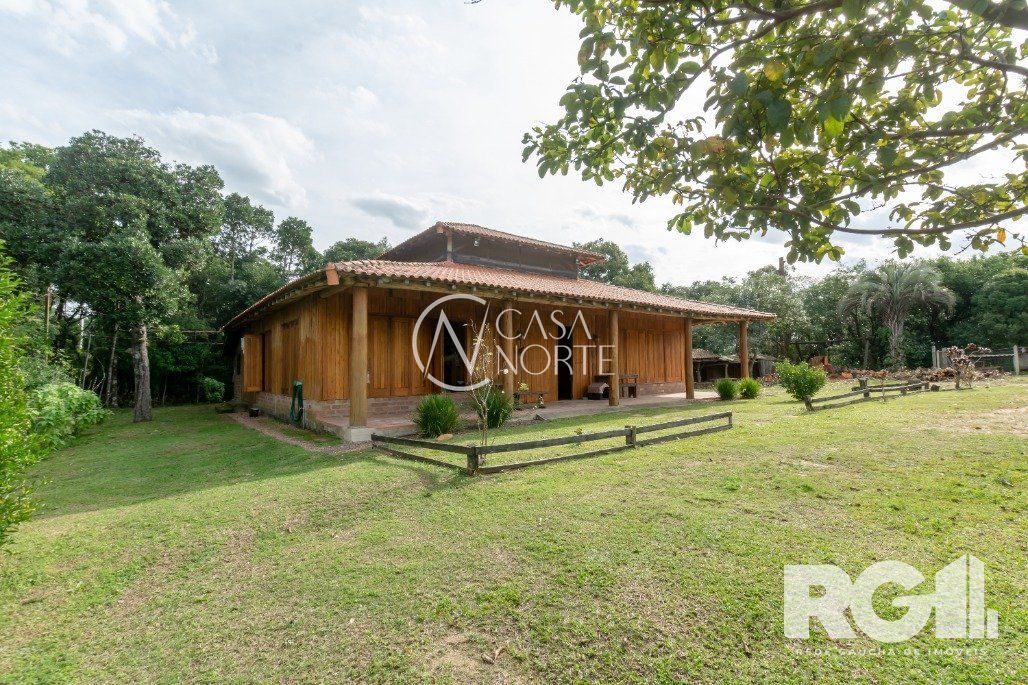 Sítio à venda com 4 quartos com 6m², 3 vagas, Avenida Edgar Pires de Castro no bairro Chapéu do Sol em Porto Alegre