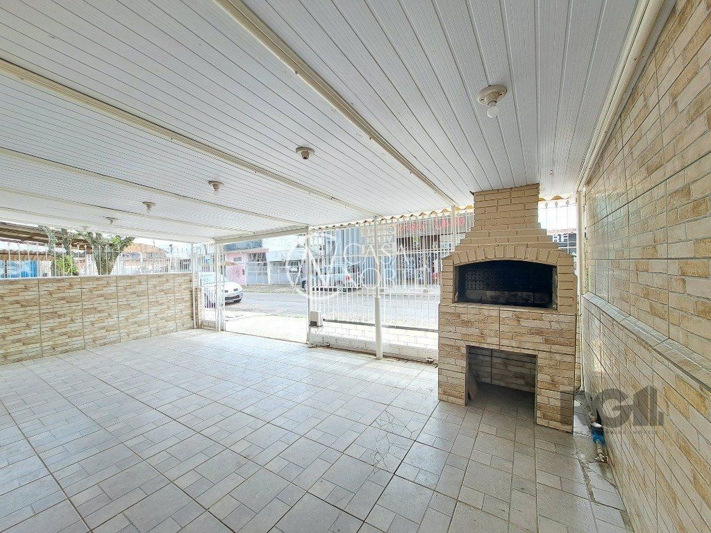 Casa à venda com 2 quartos, 59m², 2 vagas, Rua Jayme Tolpolar no bairro Farrapos em Porto Alegre