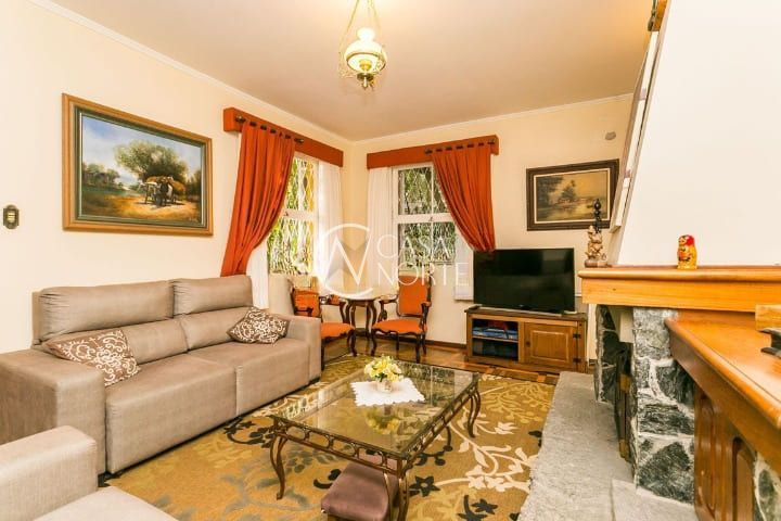 Casa à venda com 5 quartos, 420m², 2 suítes, 2 vagas, Camerino no bairro Petrópolis em Porto Alegre