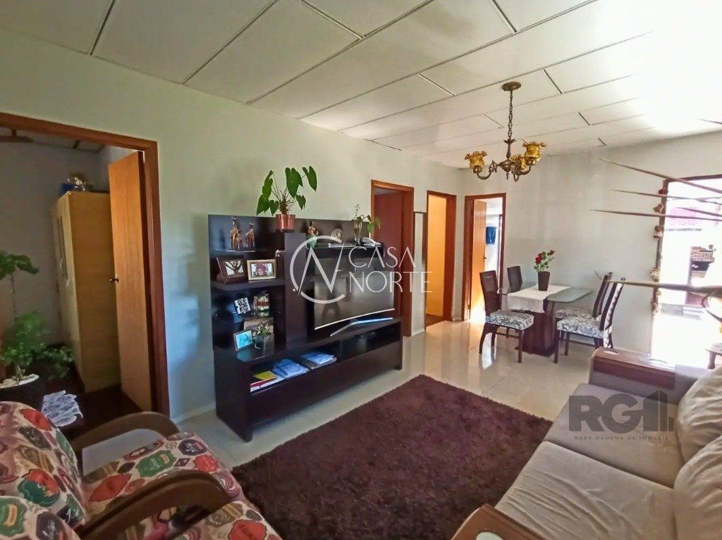 Casa à venda com 3 quartos, 65m², 2 vagas, Rua Barcelona no bairro Lomba do Pinheiro em Porto Alegre