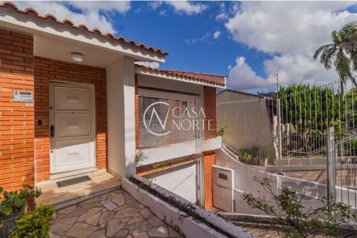 Casa à venda com 4 quartos, 414m², 1 suíte, 4 vagas, Rua Delfino Riet no bairro Santo Antônio em Porto Alegre