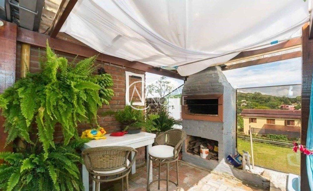 Casa de Condomínio à venda com 3 quartos, 180m², 2 suítes, 3 vagas, Estrada João Passuelo no bairro Vila Nova em Porto Alegre