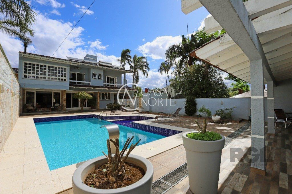 Casa à venda com 5 quartos, 598m², 4 suítes, 4 vagas, Avenida Saul Nonnenmacher no bairro Ipanema em Porto Alegre