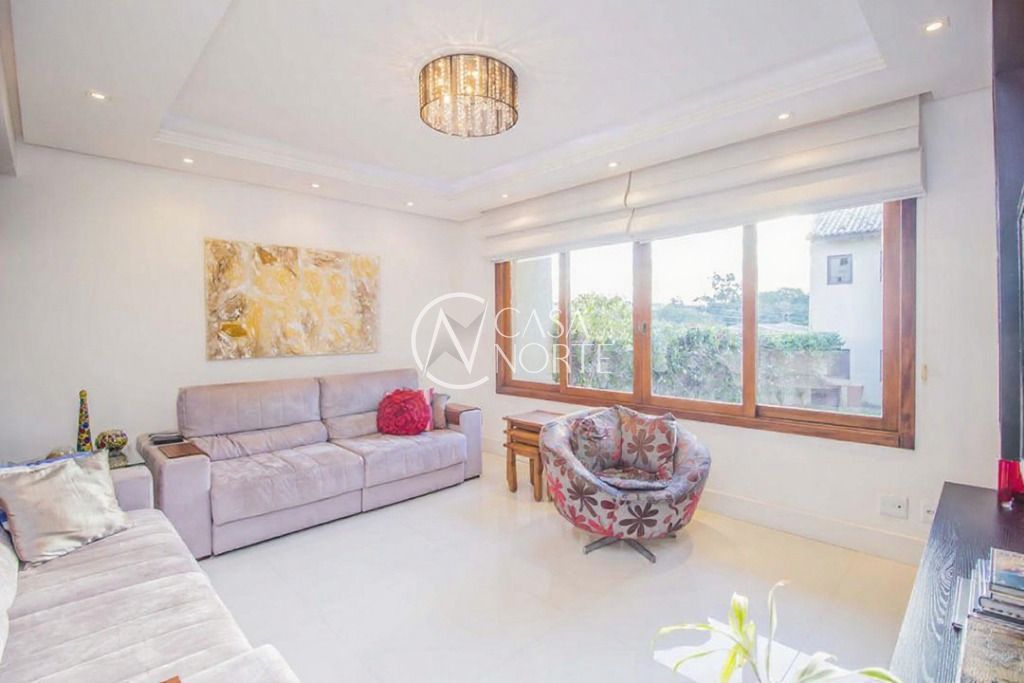 Casa de Condomínio à venda com 3 quartos, 241m², 1 suíte, 2 vagas, Estrada João de Oliveira Remião no bairro Lomba do Pinheiro em Porto Alegre