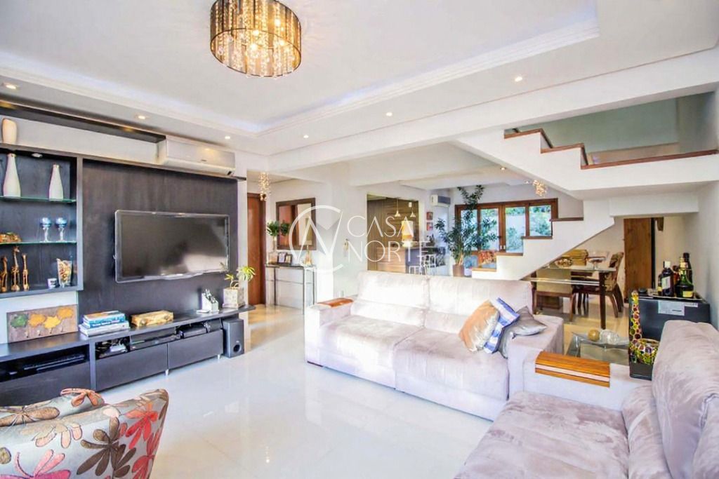 Casa de Condomínio à venda com 3 quartos, 241m², 1 suíte, 2 vagas, Estrada João de Oliveira Remião no bairro Lomba do Pinheiro em Porto Alegre