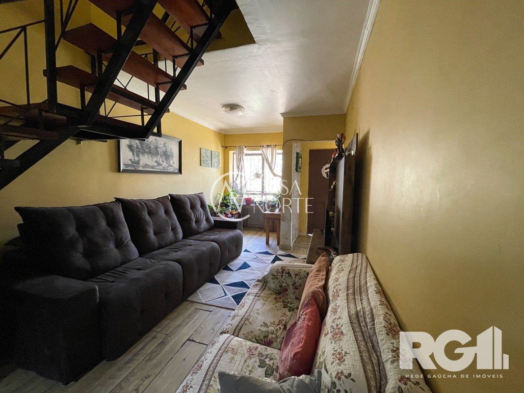 Casa à venda com 4 quartos, 180m², 1 vaga, Rua Antônio Ribeiro no bairro Santo Antônio em Porto Alegre