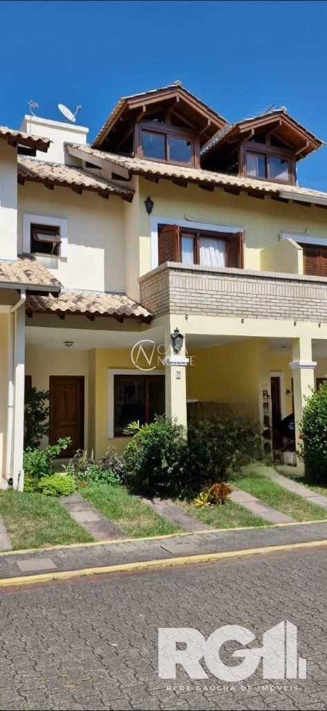 Casa de Condomínio à venda com 3 quartos, 160m², 1 suíte, 2 vagas, Avenida Eduardo Prado no bairro Cavalhada em Porto Alegre