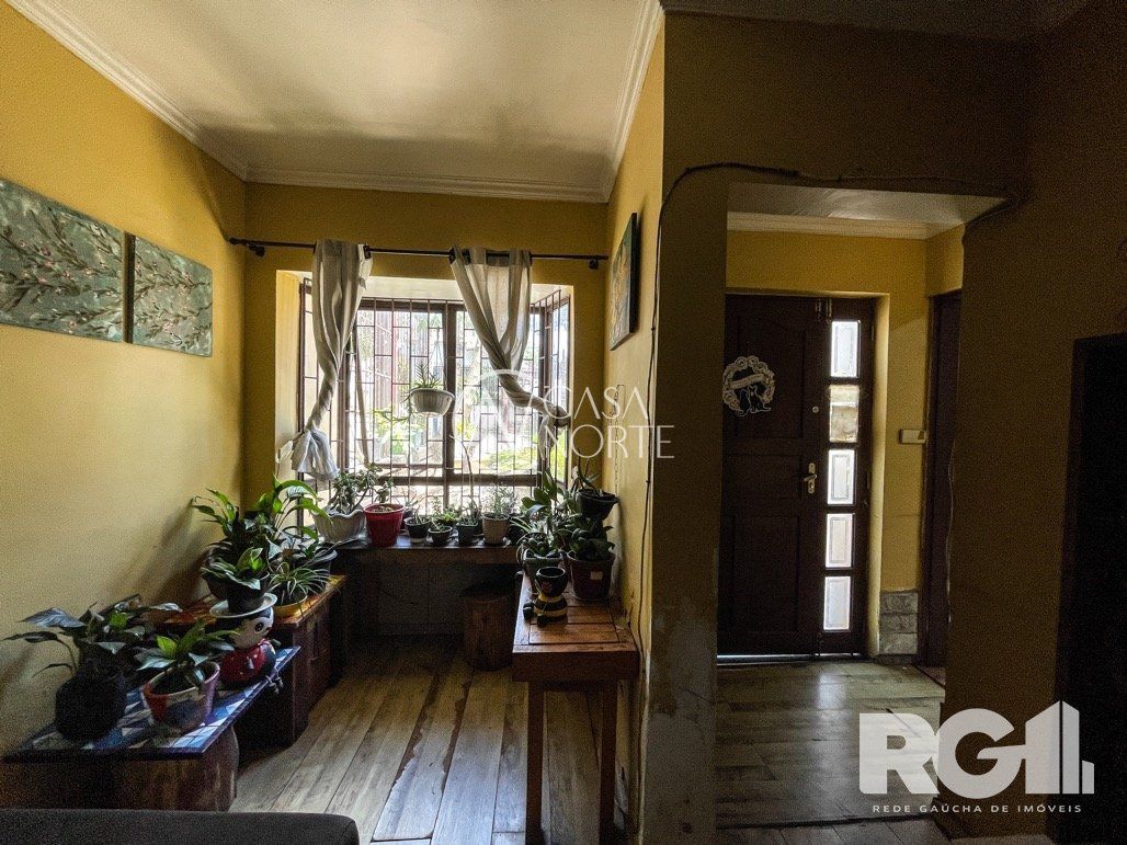 Casa à venda com 4 quartos, 180m², 1 vaga, Rua Antônio Ribeiro no bairro Santo Antônio em Porto Alegre