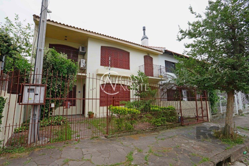 Casa à venda com 5 quartos, 230m², 1 suíte, 4 vagas, Rua Fátima no bairro Partenon em Porto Alegre