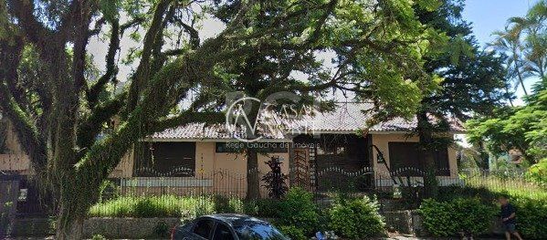 Casa à venda com 4 quartos, 400m², 1 suíte, 4 vagas, Avenida Montreal no bairro Jardim Lindóia em Porto Alegre