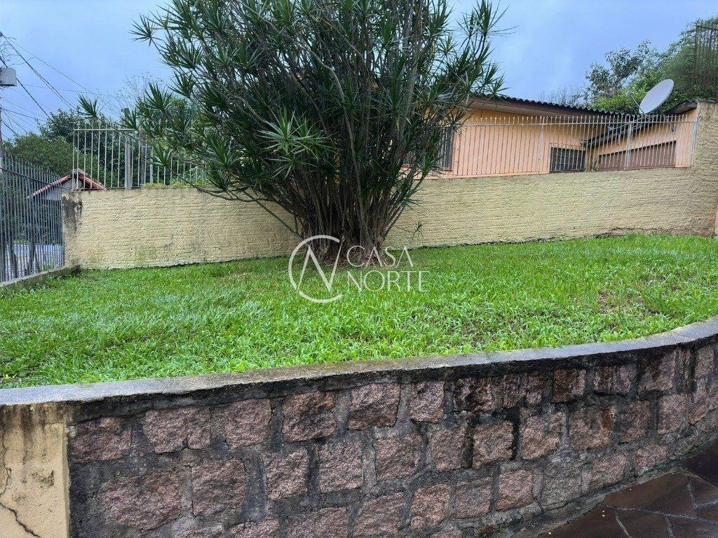 Casa à venda com 3 quartos, 129m², 1 suíte, 2 vagas, Rua Natércia Cunha Veloso no bairro Morro Santana em Porto Alegre