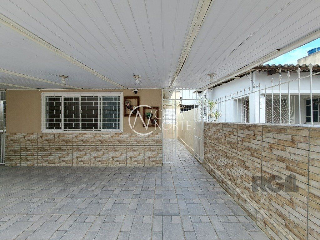 Casa à venda com 2 quartos, 59m², 2 vagas, Rua Jayme Tolpolar no bairro Farrapos em Porto Alegre