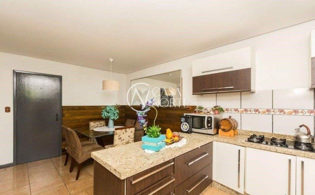 Casa de Condomínio à venda com 3 quartos, 180m², 2 suítes, 3 vagas, Estrada João Passuelo no bairro Vila Nova em Porto Alegre