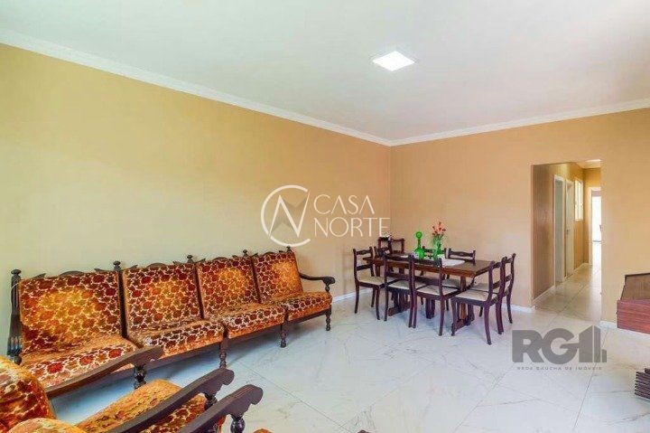 Casa à venda com 4 quartos, 201m², 2 suítes, 4 vagas, Rua Adão Baino no bairro Cristo Redentor em Porto Alegre