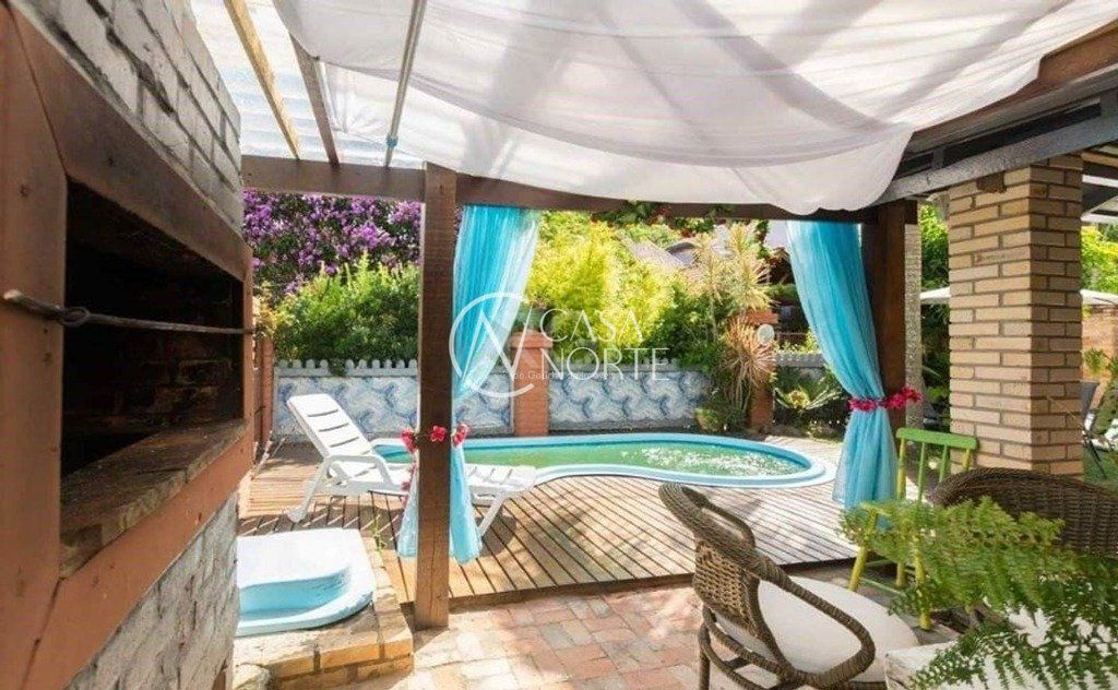 Casa de Condomínio à venda com 3 quartos, 180m², 2 suítes, 3 vagas, Estrada João Passuelo no bairro Vila Nova em Porto Alegre