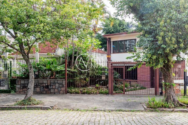 Casa à venda com 3 quartos, 154m², 3 vagas, Avenida Mariland no bairro Auxiliadora em Porto Alegre