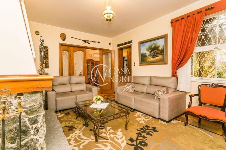Casa à venda com 5 quartos, 420m², 2 suítes, 2 vagas, Camerino no bairro Petrópolis em Porto Alegre