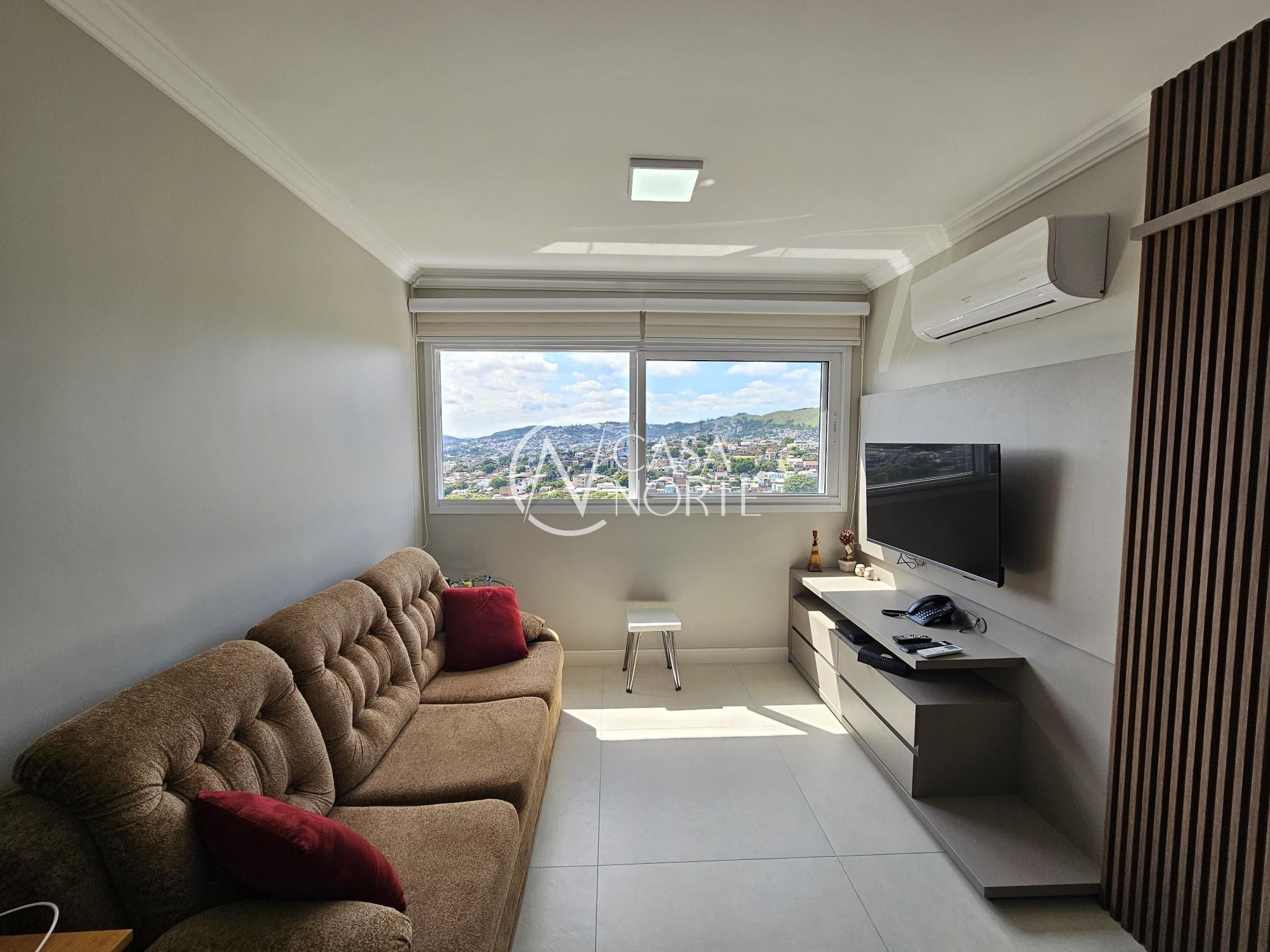 Apartamento à venda com 2 quartos, 57m², 1 suíte, 1 vaga, Joaquim Cruz no bairro Santo Antônio em Porto Alegre