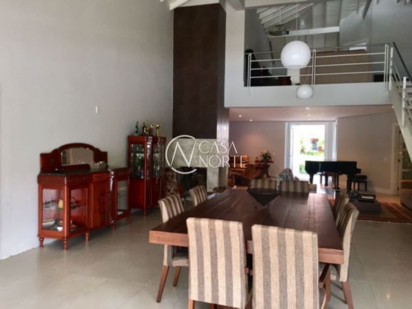 Casa de Condomínio à venda com 4 quartos, 414m², 4 suítes, 4 vagas, Avenida Juca Batista no bairro Belém Novo em Porto Alegre