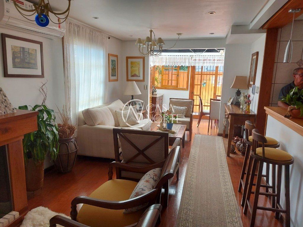 Casa de Condomínio à venda com 3 quartos, 234m², 1 suíte, 2 vagas, Rua Sargento Nicolau Dias de Farias no bairro Tristeza em Porto Alegre