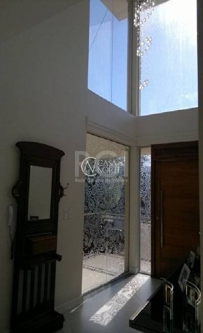 Casa de Condomínio à venda com 3 quartos, 380m², 3 suítes, 3 vagas, Rua Tocantins no bairro Lomba do Pinheiro em Porto Alegre